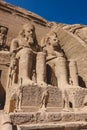 The main view of an Entrance to the Great Temple at Abu Simbel with Ancient Colossal statues of Ramesses II Royalty Free Stock Photo