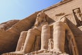 The main view of an Entrance to the Great Temple at Abu Simbel with Ancient Colossal statues of Ramesses II Royalty Free Stock Photo