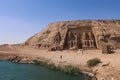 The main view of an Entrance to the Great Temple at Abu Simbel with Ancient Colossal statues of Ramesses II Royalty Free Stock Photo