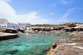 Main view of Es Calo fishermen bay, with white village houses on background, Formentera, Balearic Islands, Spain Royalty Free Stock Photo