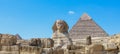 Main View to the Great Sphinx of Giza with the Great Pyramid in Background in Giza, Egypt Royalty Free Stock Photo