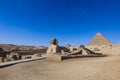 Main View to the Great Sphinx of Giza with the Great Pyramid in Background in Giza, Egypt Royalty Free Stock Photo