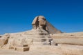 Main View to the Great Sphinx of Giza with the Great Pyramid in Background in Giza, Egypt Royalty Free Stock Photo