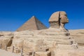 Main View to the Great Sphinx of Giza with the Great Pyramid in Background in Giza, Egypt Royalty Free Stock Photo