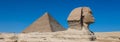 Main View to the Great Sphinx of Giza with the Great Pyramid in Background in Giza, Egypt Royalty Free Stock Photo