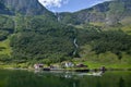 Main view of Tuftofossen waterfall and Tufto farm in Norway Royalty Free Stock Photo