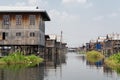 Maing Thauk, Myanmar - April 2019: traditional Burmese floating house on water in Inle lake