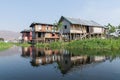 Maing Thauk, Myanmar - April 2019: traditional Burmese floating house on water in Inle lake