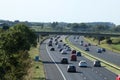 Traffic on motorway M55 in countryside, Lancashire Royalty Free Stock Photo