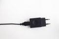 The mains plug of the charger on a white background Royalty Free Stock Photo