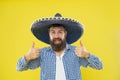 Maintain tradition. Mexican guy festive outfit ready to celebrate. Man bearded cheerful guy wear sombrero mexican hat