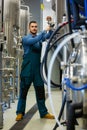 Maintained worker working at brewery Royalty Free Stock Photo