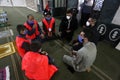 Maintaining the social distancing, gather to perform Eid al-Fitr prayer in a sports court within precautions against the novel cor