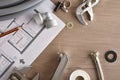 Maintenance of home plumbing with material and tools on table Royalty Free Stock Photo