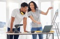 Maintenance, renovation and laptop with a couple in their new house together for a remodeling project. Construction Royalty Free Stock Photo