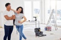 Maintenance, renovation and portrait with a couple in their new home together for a remodeling project. Construction Royalty Free Stock Photo