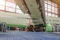 Maintenance and repair of a passenger aircraft wing. Wing flaps disassembled released