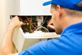 Maintenance service engineer working with gas heating boiler Royalty Free Stock Photo