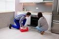 Maintenance Technician Servicing Oven Appliance