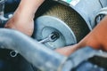 The maintenance technician is using a wrench to remove the air filter for cleaning,Concept repair the car. Instagram style filter