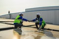 Maintenance technicians installing solar panels at solar cell farm Royalty Free Stock Photo