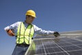 Maintenance Worker Measuring Solar Cells