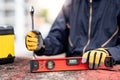 Maintenance worker preparing work tool at site Royalty Free Stock Photo