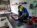 Maintenance worker welder, craftsman welding metal iron material, with flash light