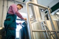 Maintenance worker working at brewery Royalty Free Stock Photo