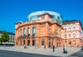 MAINZ, GERMANY, AUGUST 17, 2018: Tourists are passing by the Staatstheatre in the center of Mainz, Germany