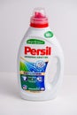 Liquid laundry detergent Persil in a plastic container on a plain background Royalty Free Stock Photo