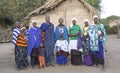 Maasai family in their colorful clothing