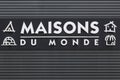 Maisons du Monde logo on a wall