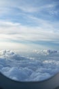 Majastic cloudscape view through porthole Royalty Free Stock Photo