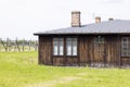 Majdanek concentration and extermination camp, view of wooden barrack and barbed wire fence, Lublin, Poland