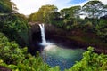 Majesitc Rainbow Falls waterfall in Hilo, Wailuku River State Park, Hawaii Royalty Free Stock Photo