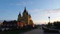 The majestic Alexander Nevsky Cathedral on Strelka on the new Okskaya embankment in the autumn evening sun