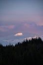 Majestic Alpen Glow hitting mountain peaks in Scottish Highlands during stunning Winter landscape sunrise Royalty Free Stock Photo