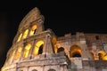 Majestic ancient Colosseum by night in Rome, Italy Royalty Free Stock Photo