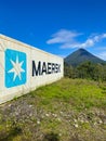 The majestic Arenal volcano and Maersk container