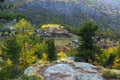 Majestic autumn alpine scenery with colorful larch forest