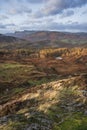 Majestic Autumn sunset landscape image from Holme Fell looking towards Coniston Water in Lake District Royalty Free Stock Photo
