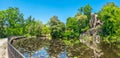 The majestic big statue of Colosso dell Appennino giant statue and pond in public gardens of Pratolino near Florence in