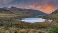 The majestic black lagoon in the snowy park where the Nevado del Ruiz,