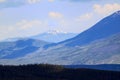 Majestic Snowy and Blue Rocky Mountain Peak