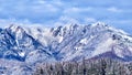 Majestic blue rocky mountains covered in snow