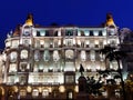 Majestic Building illuminated by night in Madrid Spain