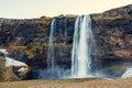 Majestic cascade in icelandic scenery