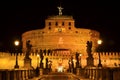 Majestic Castle of Saint Angel over the Tiber river by night in Rome, Italy