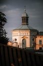 Majestic church with a tall steeple silhouetted against a cloudy sky Royalty Free Stock Photo